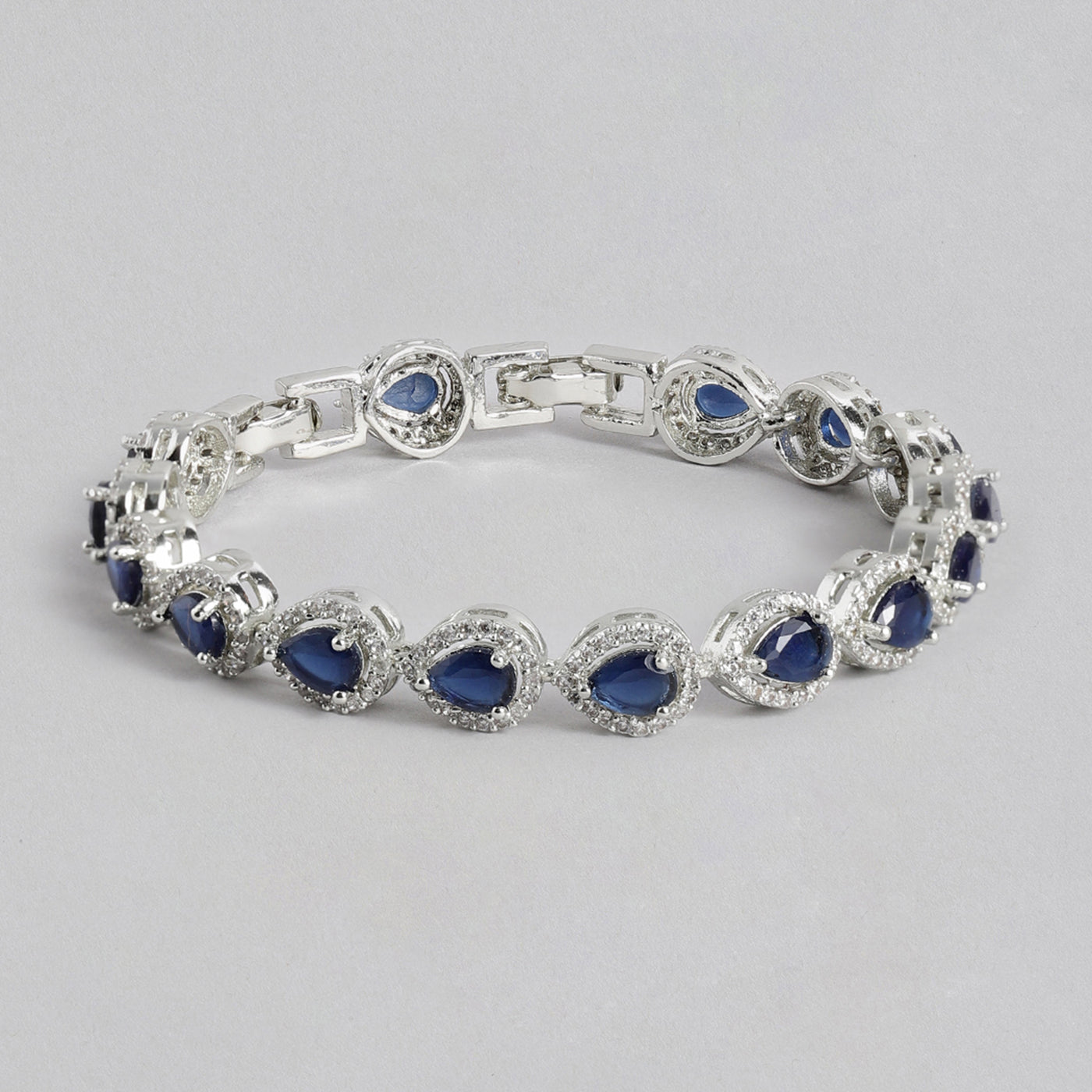 Estele Rhodium Plated CZ Drop Designer Bracelet with Blue Stones for Women