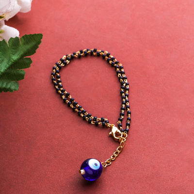 Estele Gold Plated Splendid Evil Eye Black Beads Bracelet for Women