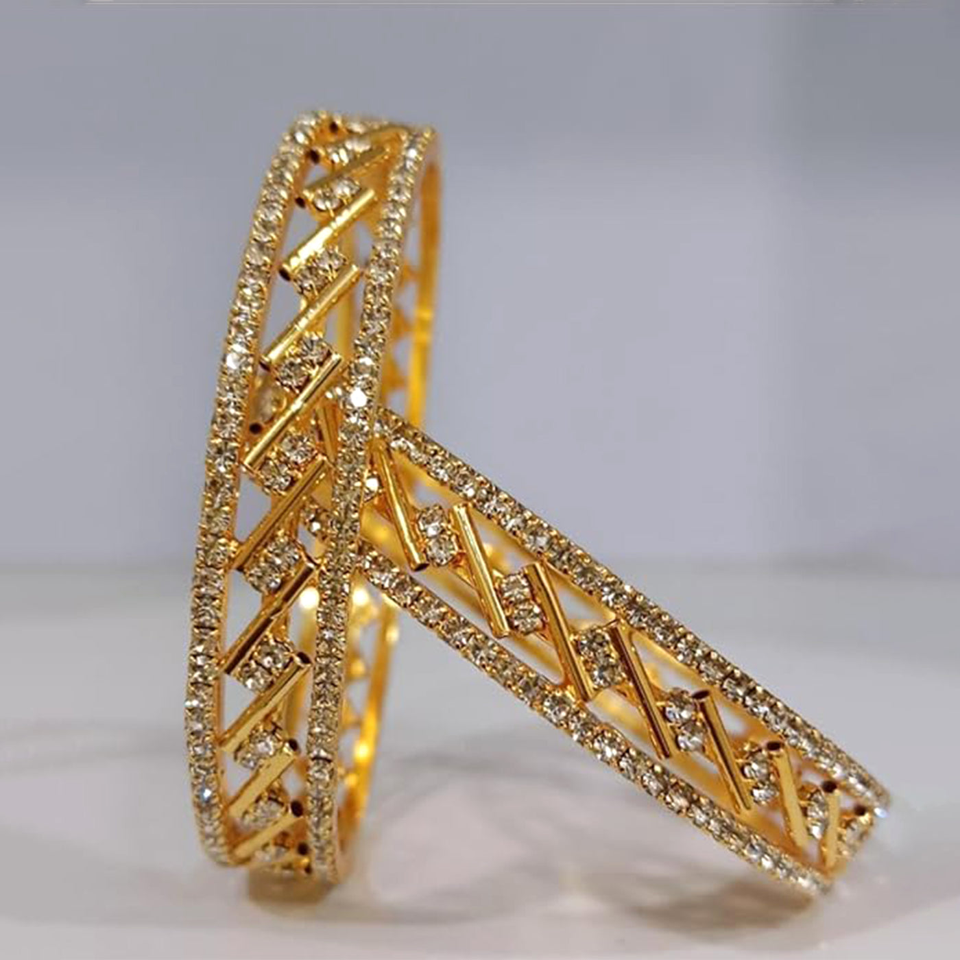 Estele Gold Plated Criss-Cross 2:4 Size Bangles | Modern Jewelry for Women – OSBR-VKL11039 BANGLE