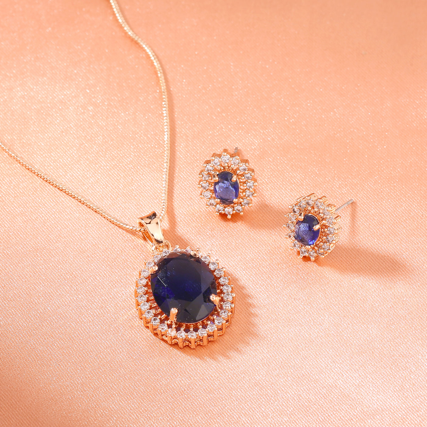 Estele Rose Gold Plated CZ Round Designer Pendant Set with Blue Stones for Women