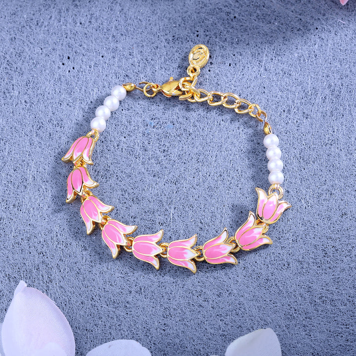 Estele Gold Plated Pink Enamelled Lotus Designer Link Chain Adjustable Bracelet with Pearls for Girl's & Women