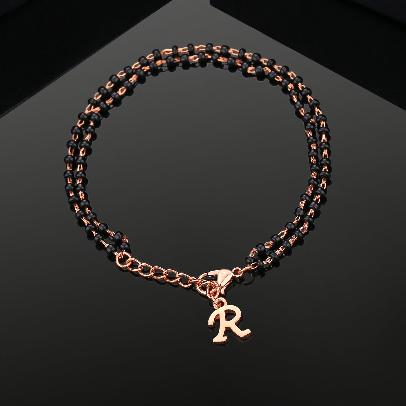 Estele Rose Gold Plated Fascinating "R" Alphabet with Black Beads Bracelet for Women