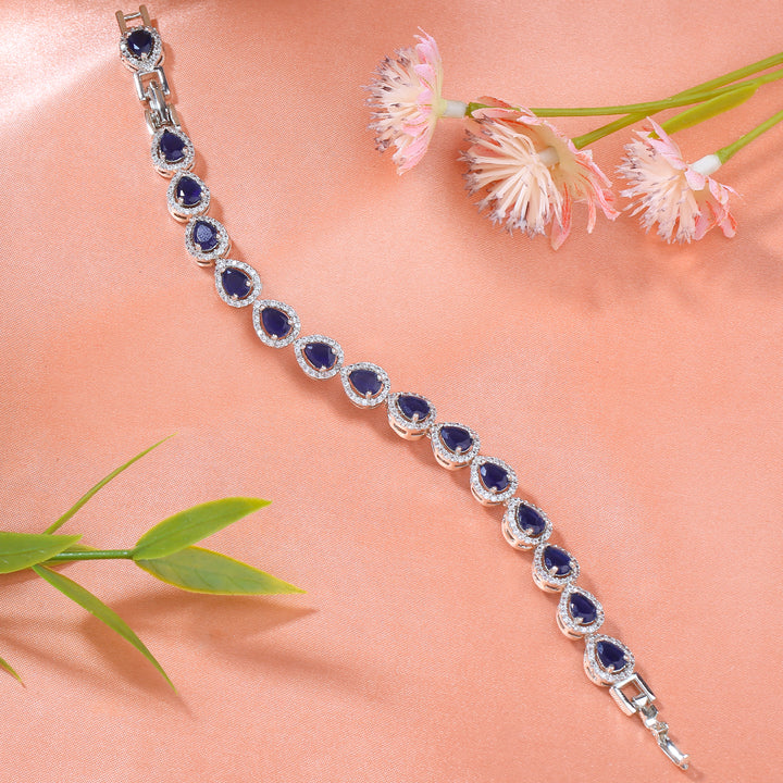 Estele Rhodium Plated CZ Drop Designer Bracelet with Blue Stones for Women