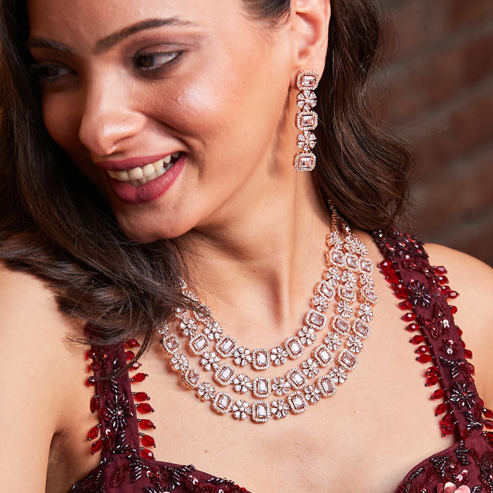 Estele Rose Gold Plated CZ Dazzling Three Layered Dulhan Necklace Set with White Stones for Women