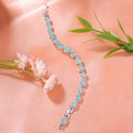Estele Rhodium Plated CZ Classic Drop Designer Bracelet with Mint Green Stones for Women