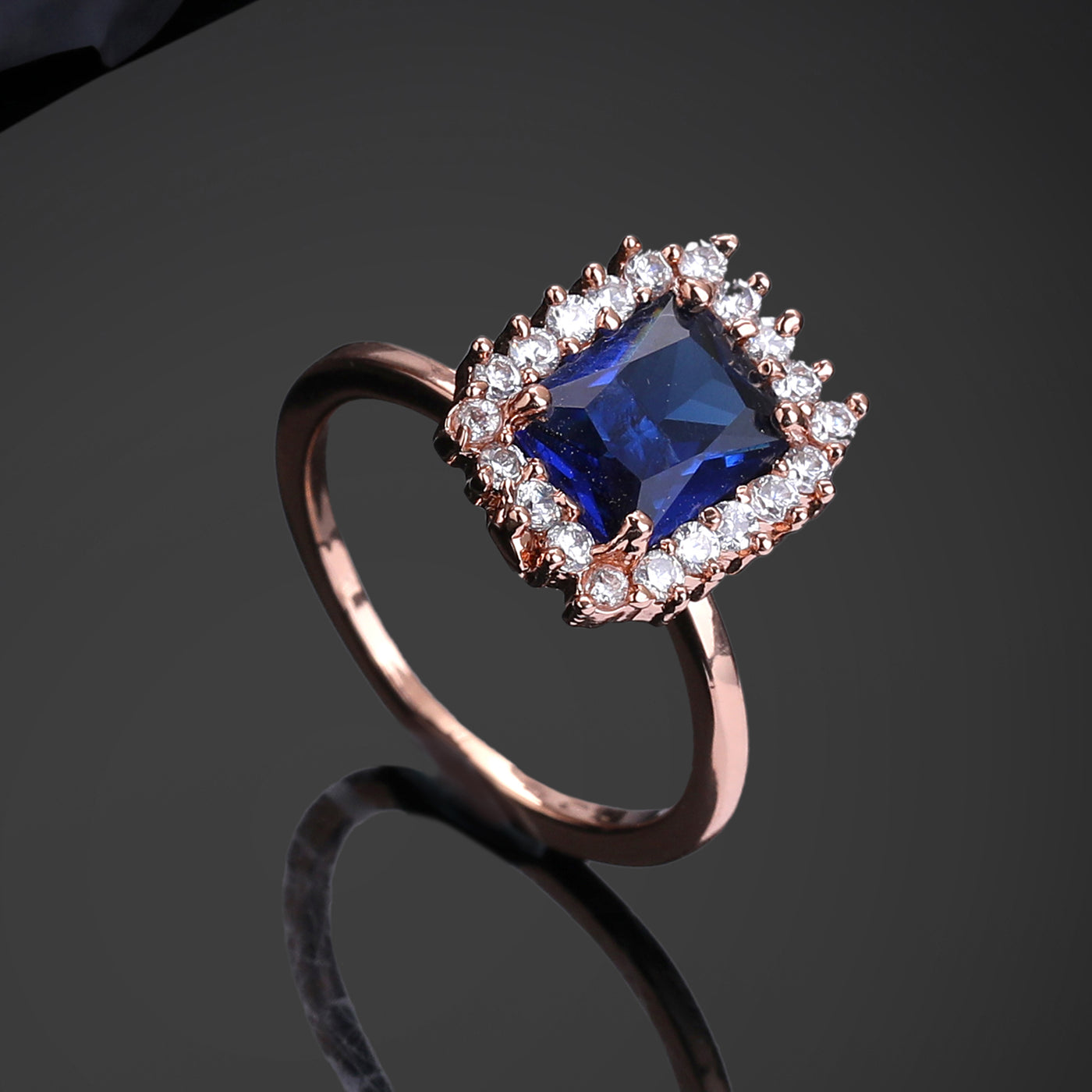 Estele Rose Gold Plated CZ Square Designer Finger Ring With Blue Stones for Women(Adjustable)