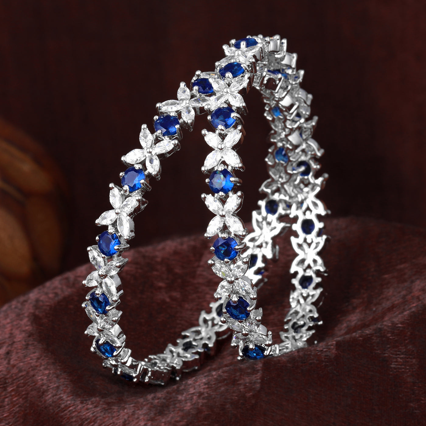 Estele Rhodium Plated CZ Flower Designer Bangles with Blue Stones for Women