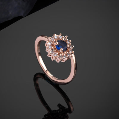 Estele Rose Gold Plated CZ Flower Designer Finger Ring with Blue Stones for Women (Adjustable)