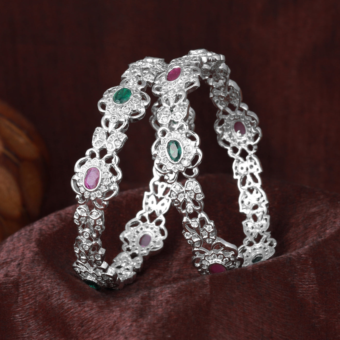 Estele Rhodium Plated CZ Daisy Flower Shaped Bangles with Ruby & Green Stones for Women