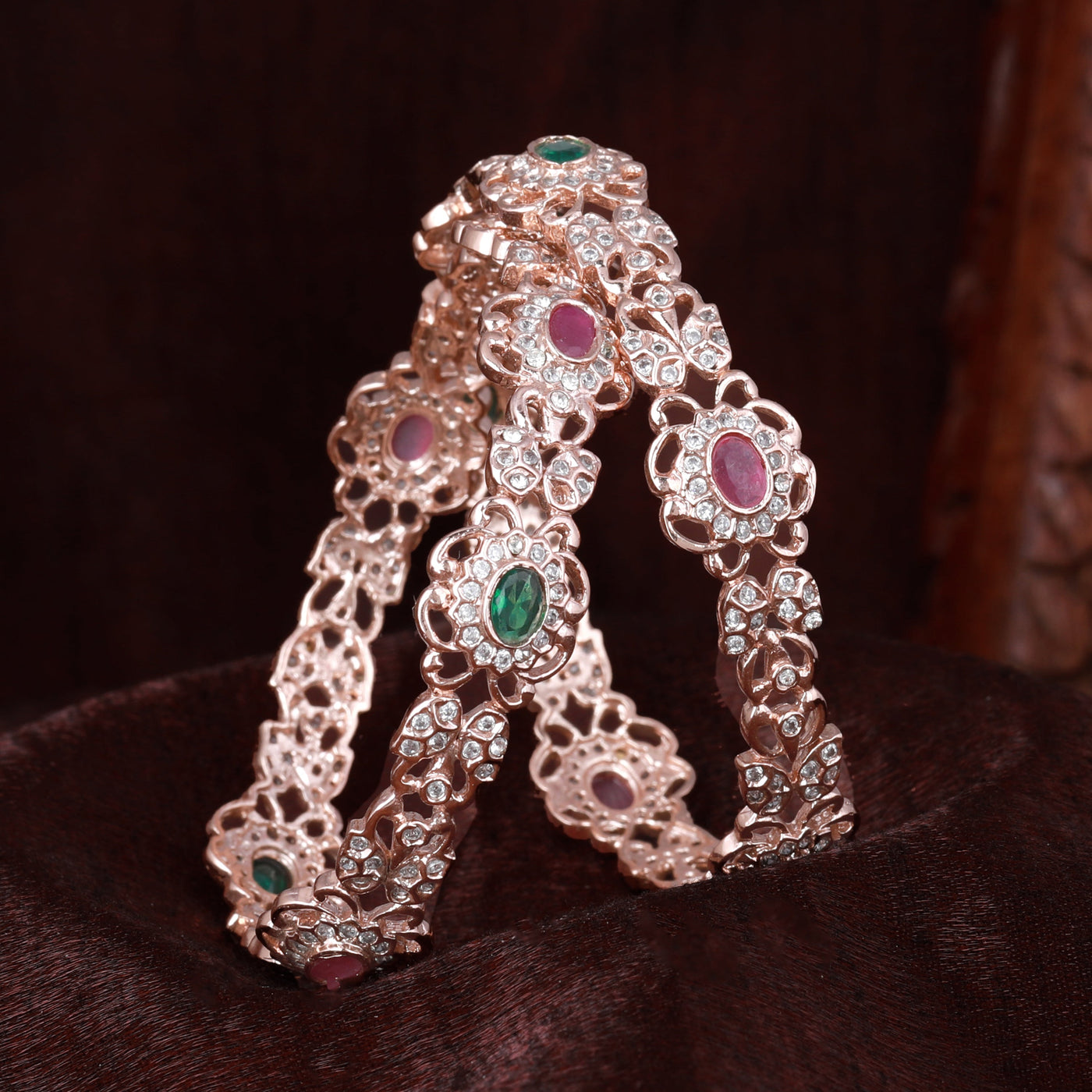 Estele Rose Gold Plated CZ Daisy Flower Shaped Bangles with Ruby & Green Stones for Women