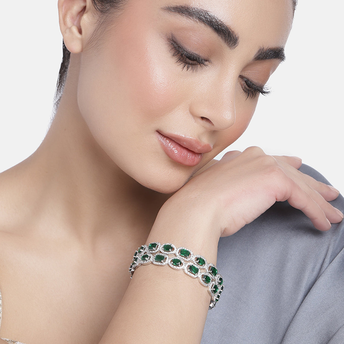 Estele Rhodium Plated CZ Sparkling Bangles with Green Stones for Women