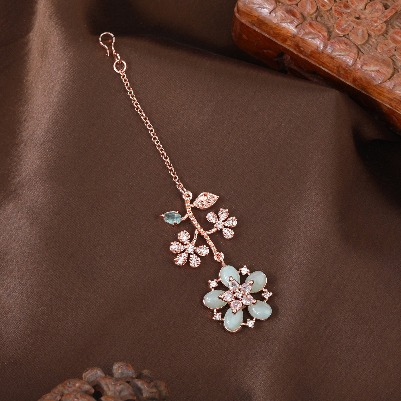 Estele Rosegold Plated Stylish Leafy Floral Designer Varya Maang Tikka with Mint Green Beads|A Refined Choice for Trendy Women