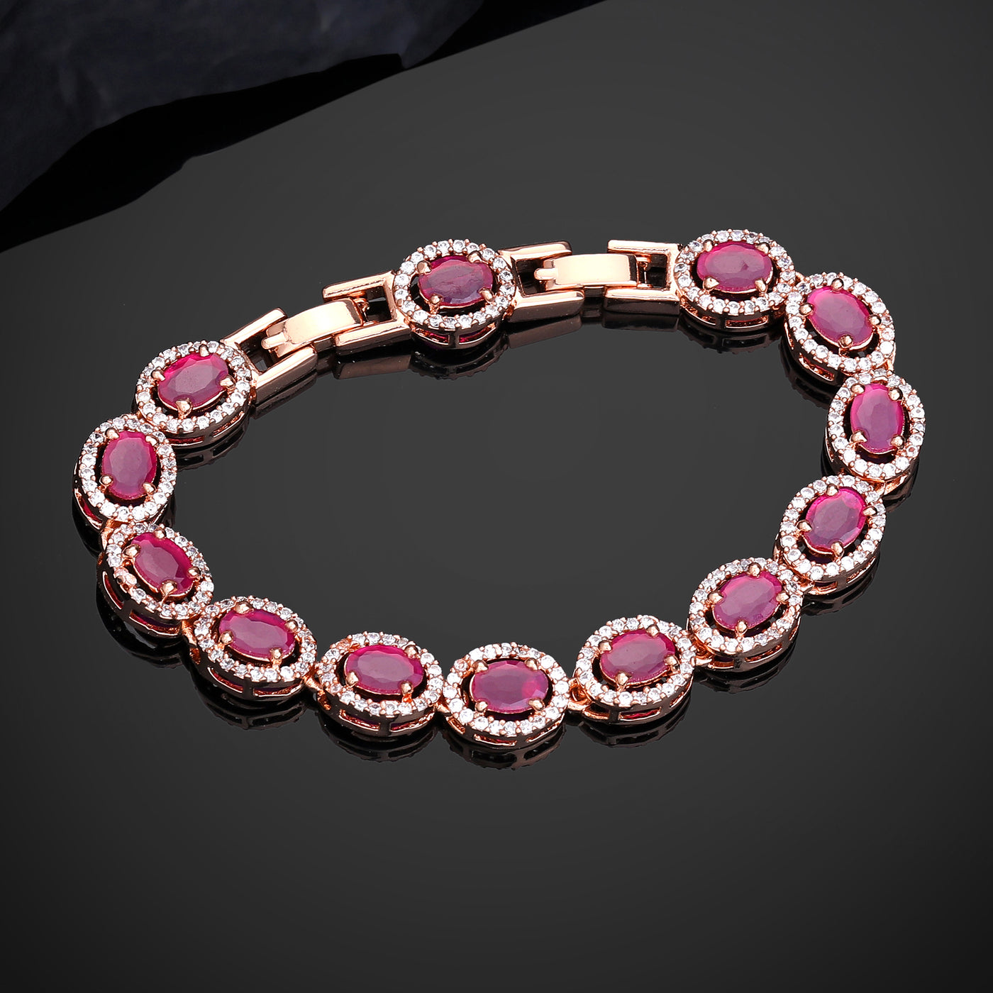 Estele Rosegold Plated Exquisite Ruby American Diamond Adorned Charm Bracelet for Women – A Touch of Luxury for Your Style