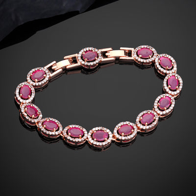 Estele Rosegold Plated Exquisite Ruby American Diamond Adorned Charm Bracelet for Women – A Touch of Luxury for Your Style