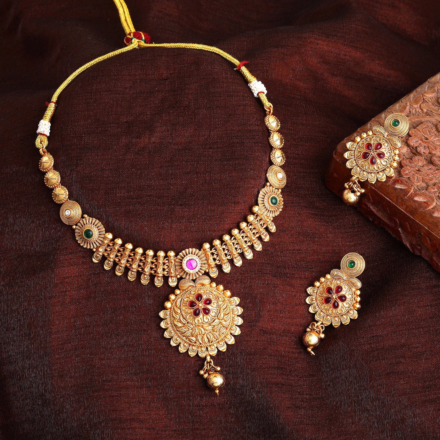 Estele Gold Plated Latest & Trendy Floral Pattern Matt Finish Temple Necklace set with Ruby & Green Stones for Women