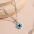 Estele Rhodium Plated Round Shaped Evil Eye Charm Pendant for Girls/Women