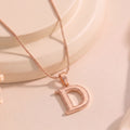Estele - Charm D Rosegold plated Pendant