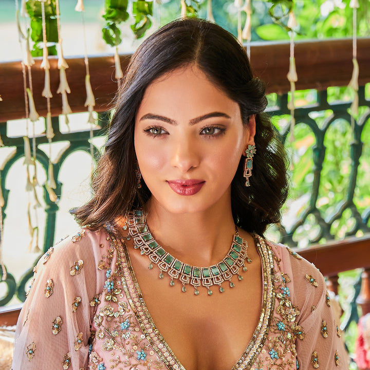 Estele Rose Gold Plated CZ Glimmering Dulhan Necklace Set with Mint Green and White Crystals for Women