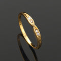 Estele Gold Plated Inter Twined Finger Ring with Crystals for Women