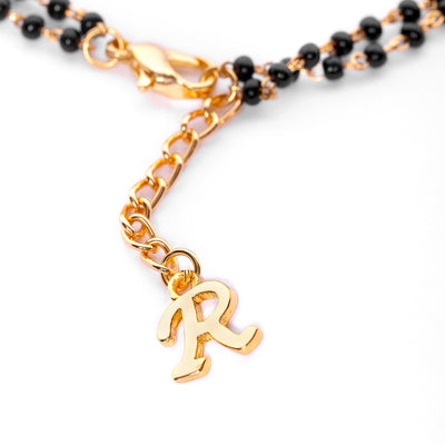 Estele Gold Plated Fascinating "R" Alphabet with Black Beads Bracelet for Women
