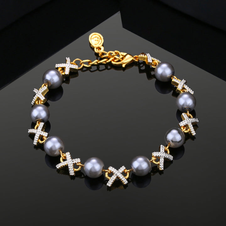 Estele Gold Plated Sparkling Designer Bracelet with Pearl for Women