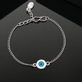 Estele Rhodium Plated Classic Turquoise Blue Evil Eye White Enamel Charm Bracelet