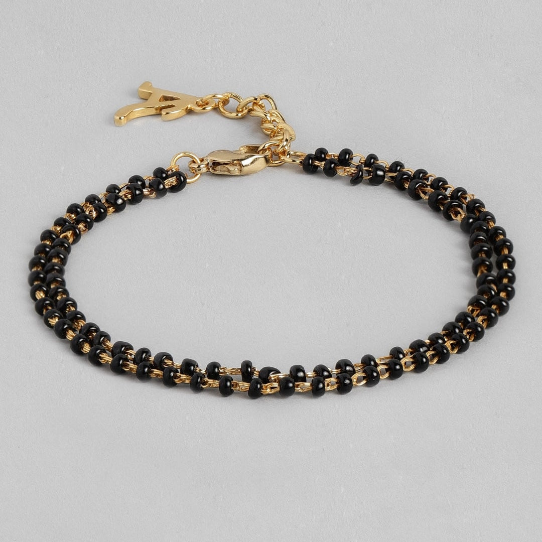Estele Gold Plated Fascinating "A" Alphabet with Black Beads Bracelet for Women