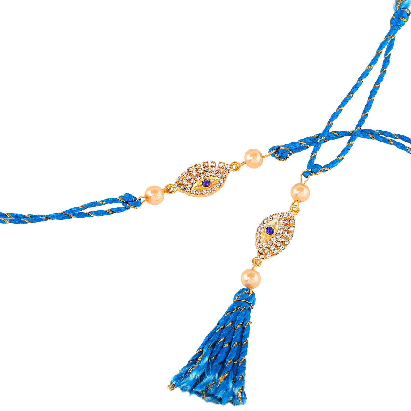 Estele Gold Plated Sacred Evil Eye Rakhi Set for Bhaiya Bhabhi with White & Blue Austrian Crystals and Fancy Silk Thread