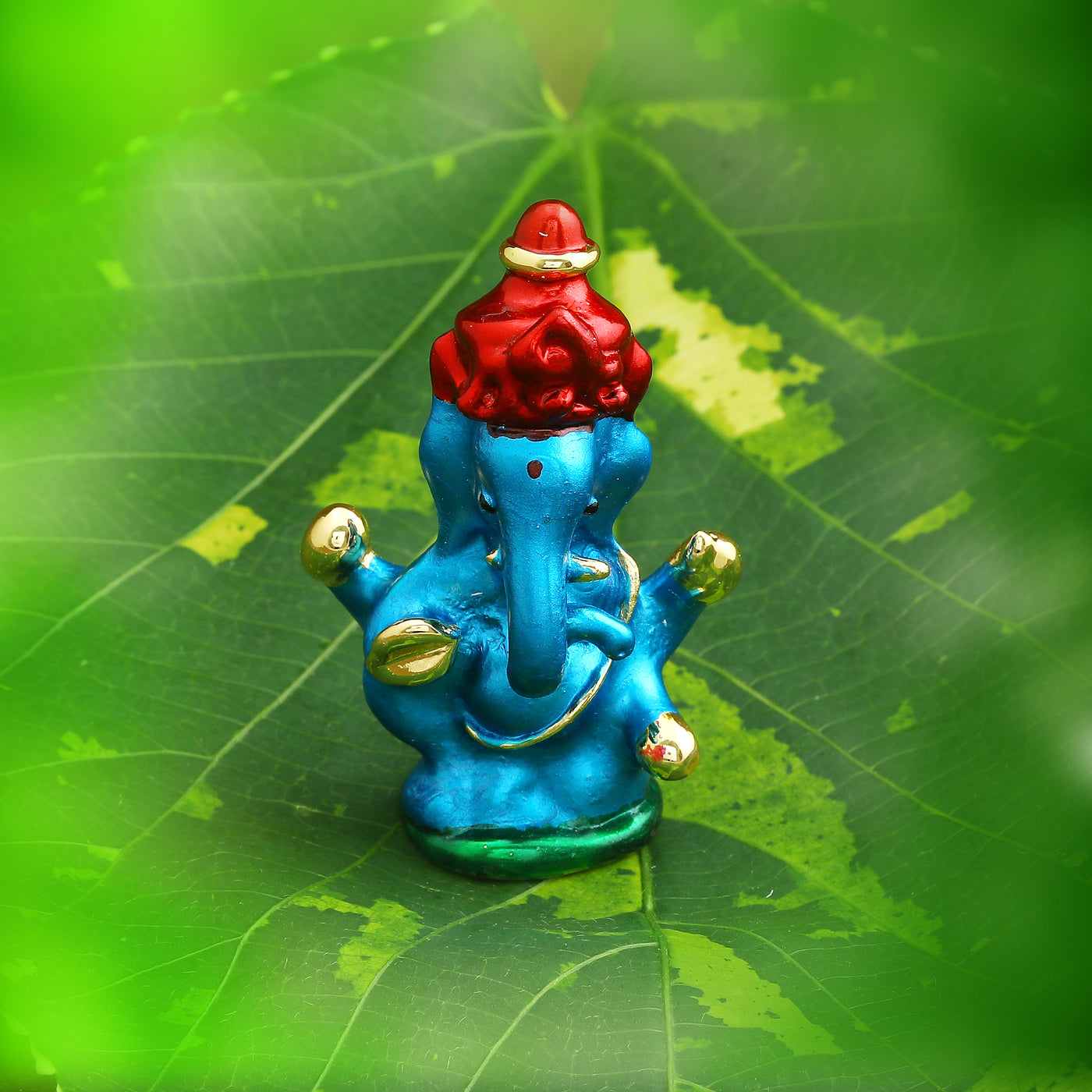 Estele Gold Plated Divine Ganesh Idol (Enamel)