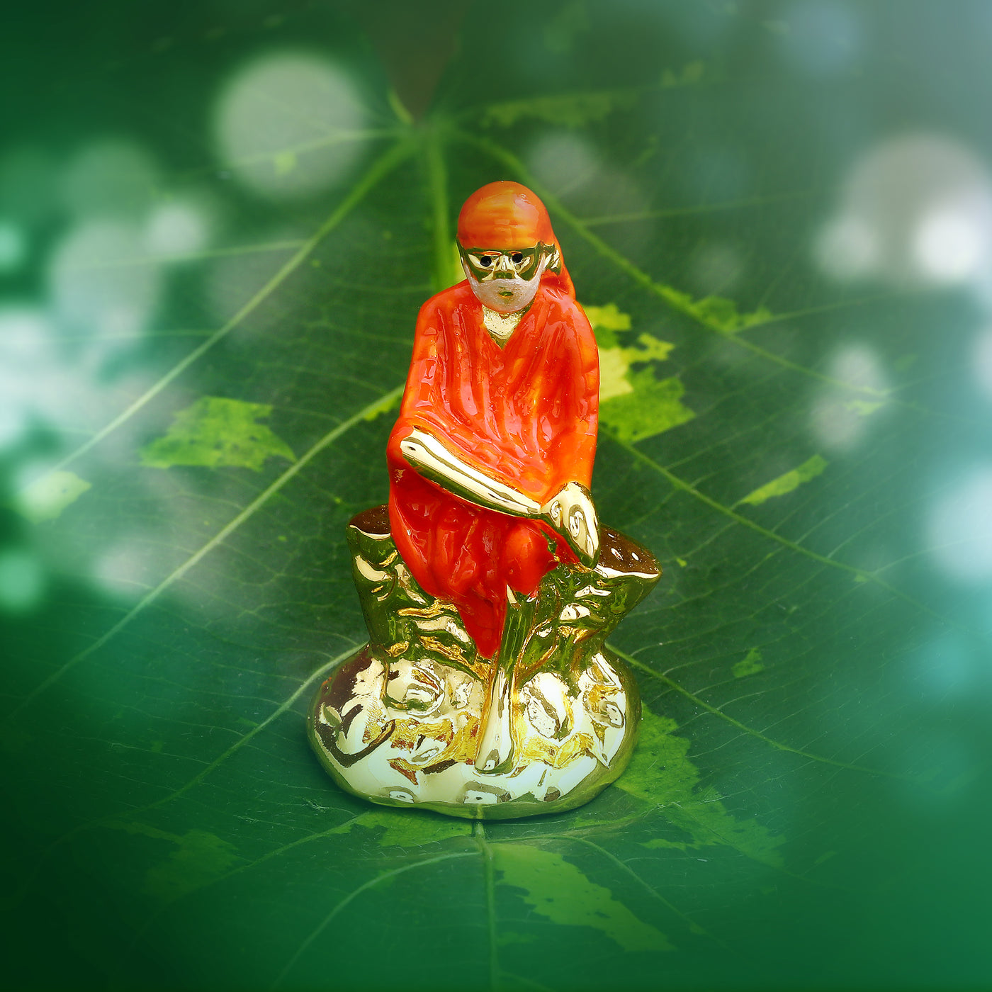 Estele Gold Plated Enamel Lord Sai Baba Idol