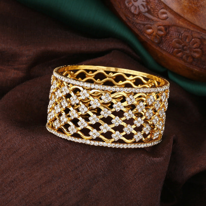 Estele Gold Plated Scintillating Bangle with Glowing Crystals for Women
