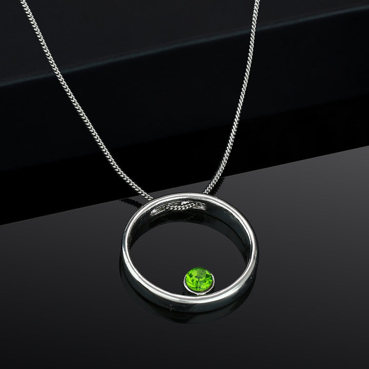Estele Rhodium Plated Polaris Ring Green Stone Pendant for women / Girls