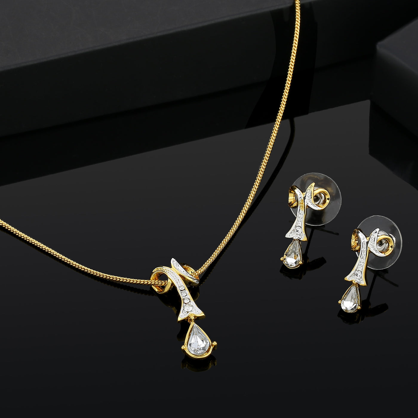 Estele 24 Kt Gold Plated Twisted Drop with Fancy Austrian Crystal Pendant Set for Women