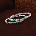 Estele Rhodium Plated Luxurious Green & White American Diamonds 2:6 Size Bangles| Modern & Graceful Jewelry for Women