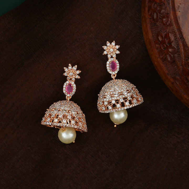 Estele Rose Gold Plated CZ Designer Jaliwala Jhumka Earrings with Pearl & Ruby Crystals for Women