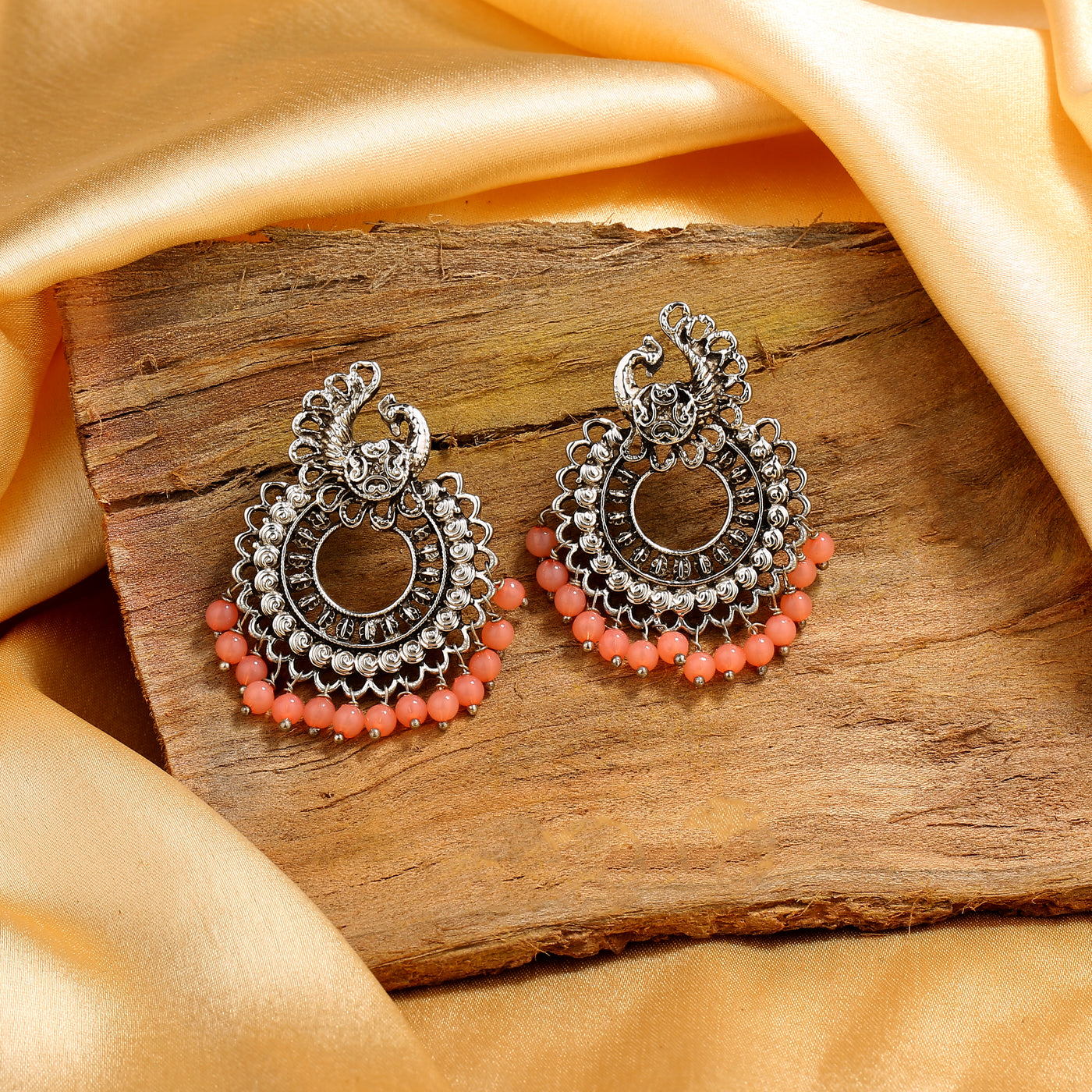 Estele Rhodium Plated Oxidised Splendid Earrings with Orange Beads for Women