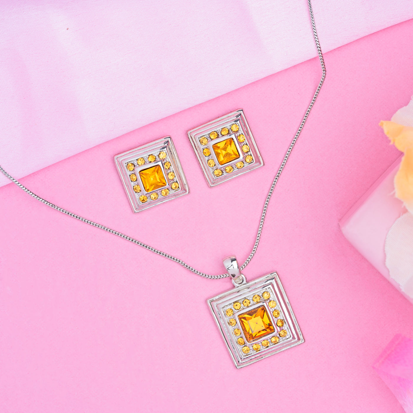 Estele Rhodium Plated- Yellow dusky pendant set with fancy topaz crystals