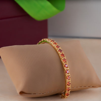 Estele Gold Plated Candy Bracelet with Orange American Diamonds Bracelet (adjustable)