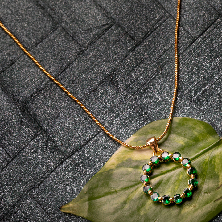 Estele Gold Plated Trendy Candy Pendant with Green Crystals for Women