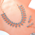 Estele Rose Gold Plated CZ Fascinating Necklace Set with Mint Blue Stones for Women