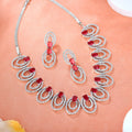 Estele Rhodium Plated CZ Circular Designer Necklace Set with Tourmaline Pink Crystals for Women