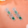 Estele Rhodium Plated CZ Scintillating Designer Drop Earrings with Green Crystals for Women