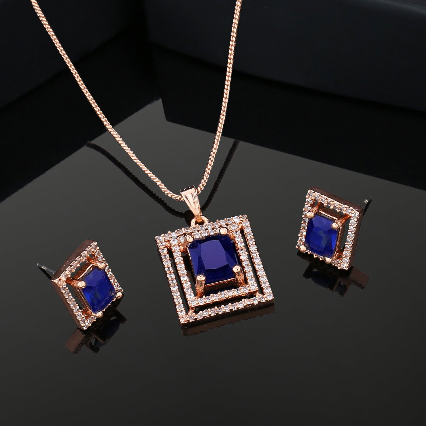 Estele Rose Gold Plated CZ Fascinating Pendant Set with Blue Crystals for Women