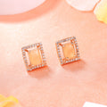 Estele Rose Gold Plated CZ Dazzling Designer Stud Earrings with Mint Orange Crystals for Women