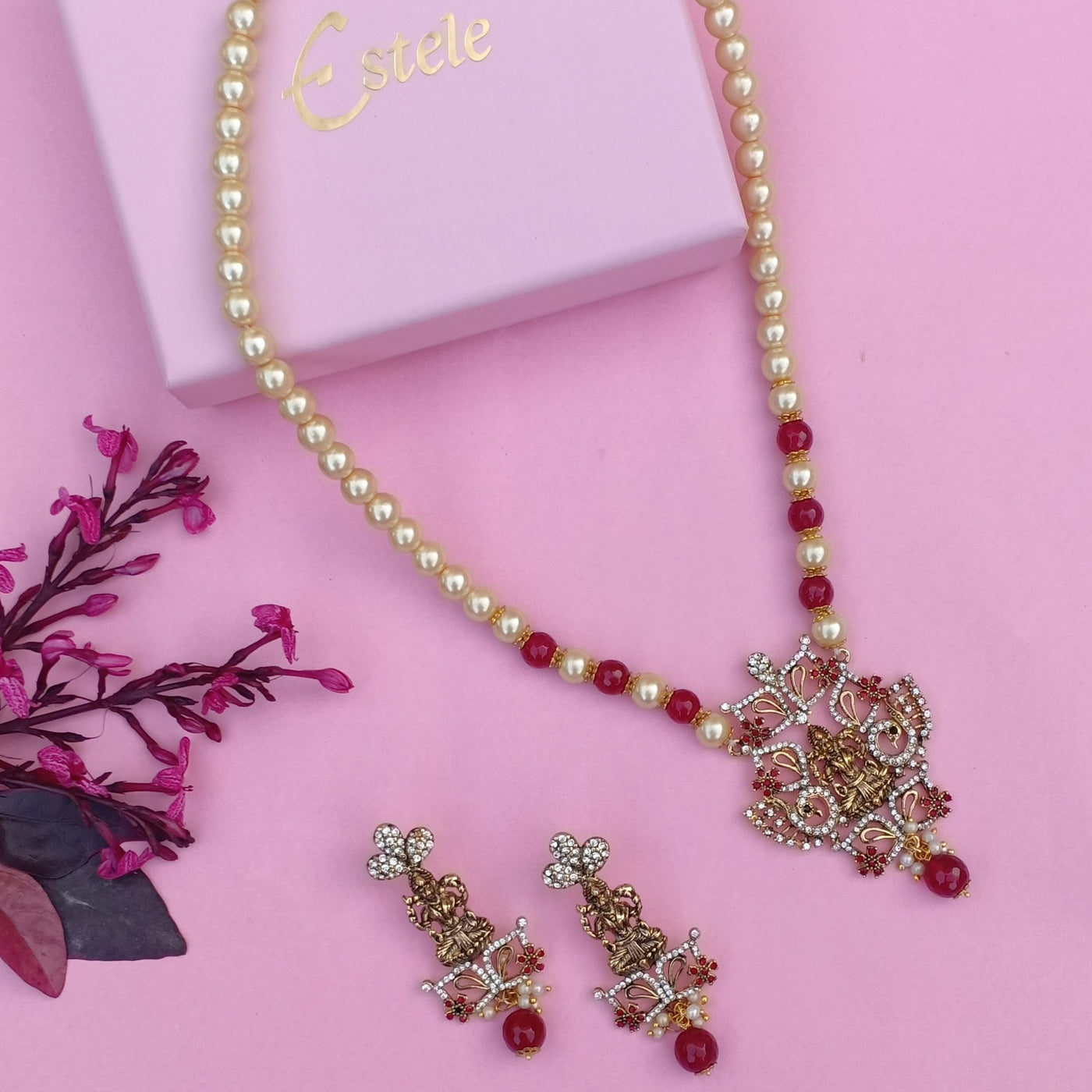Estele Gold Plated Antique Single Pearl Line with Laxmi Devi Designer Necklace Set with Austrian Crystals and Ruby Beads for Women